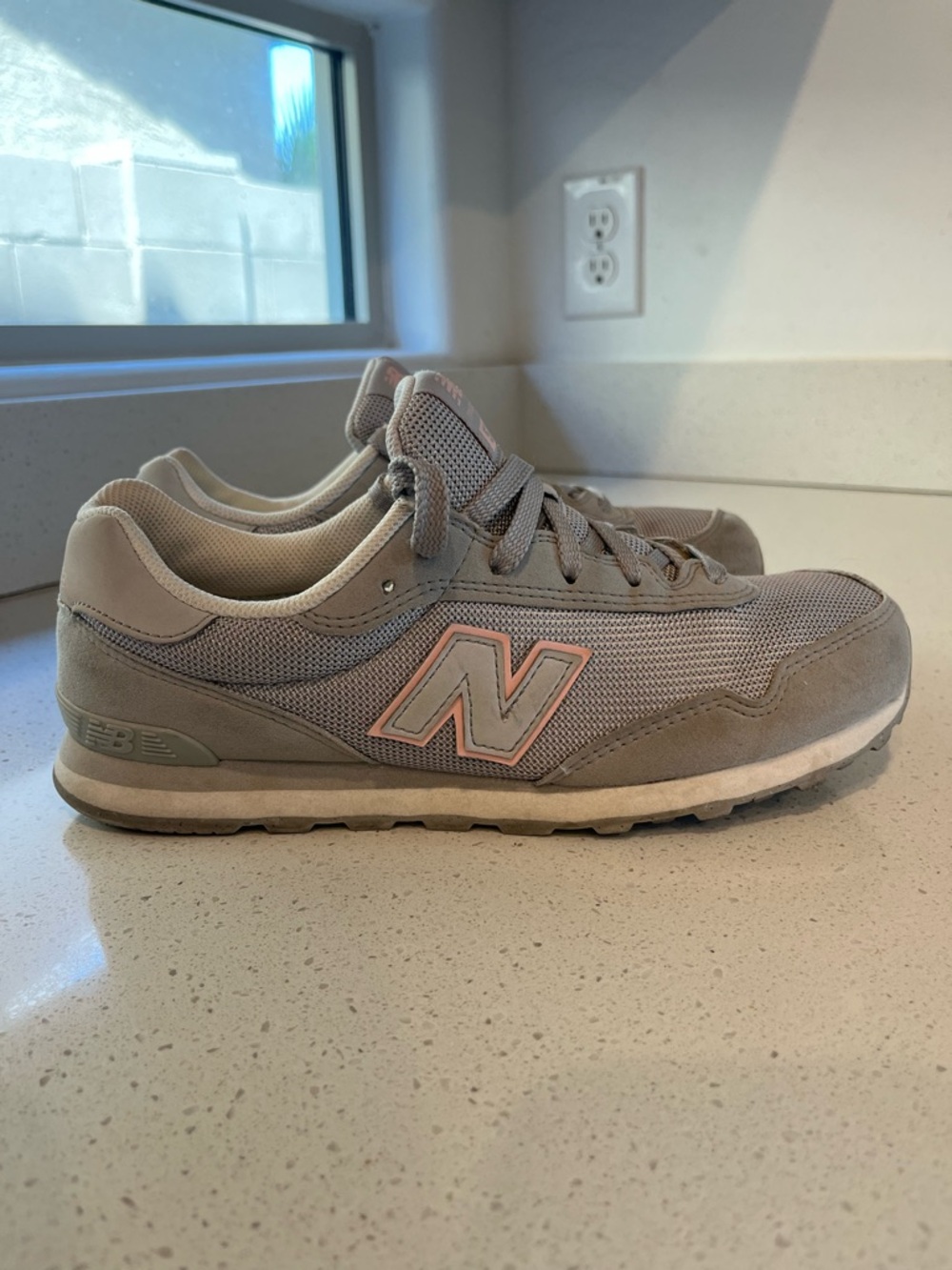 New Balance Women's Grey Sneakers with Pink Logo Accent
